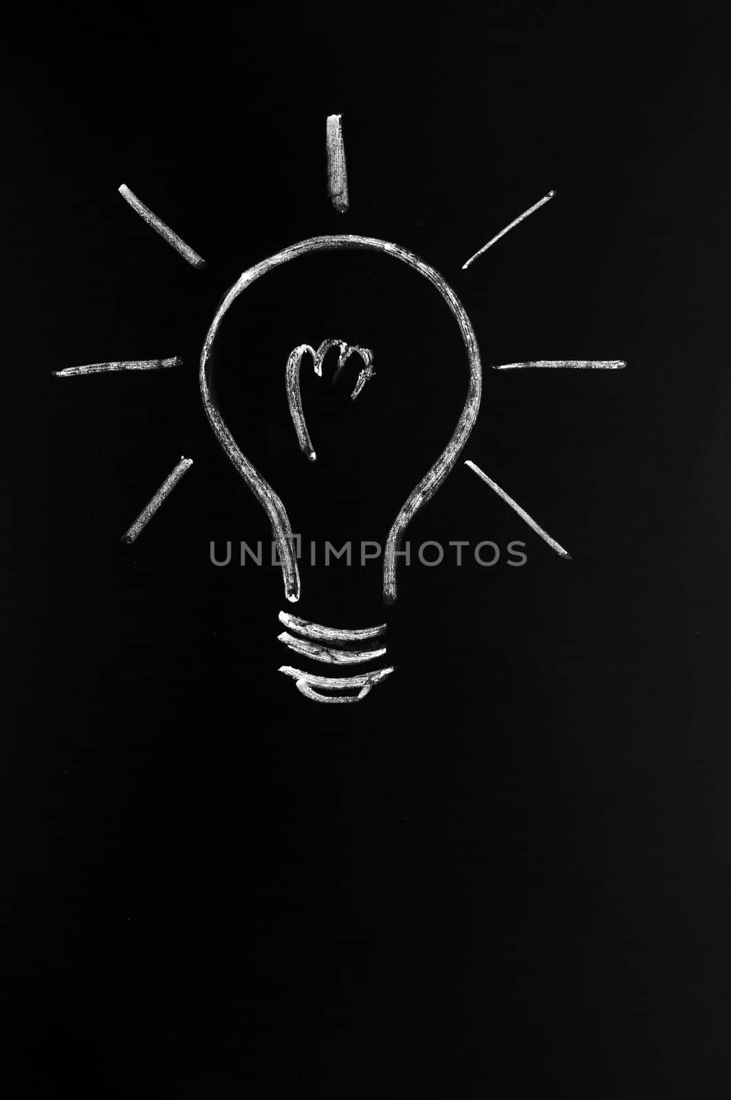 Light bulb drawn with chalk, symbol of innovation and idea