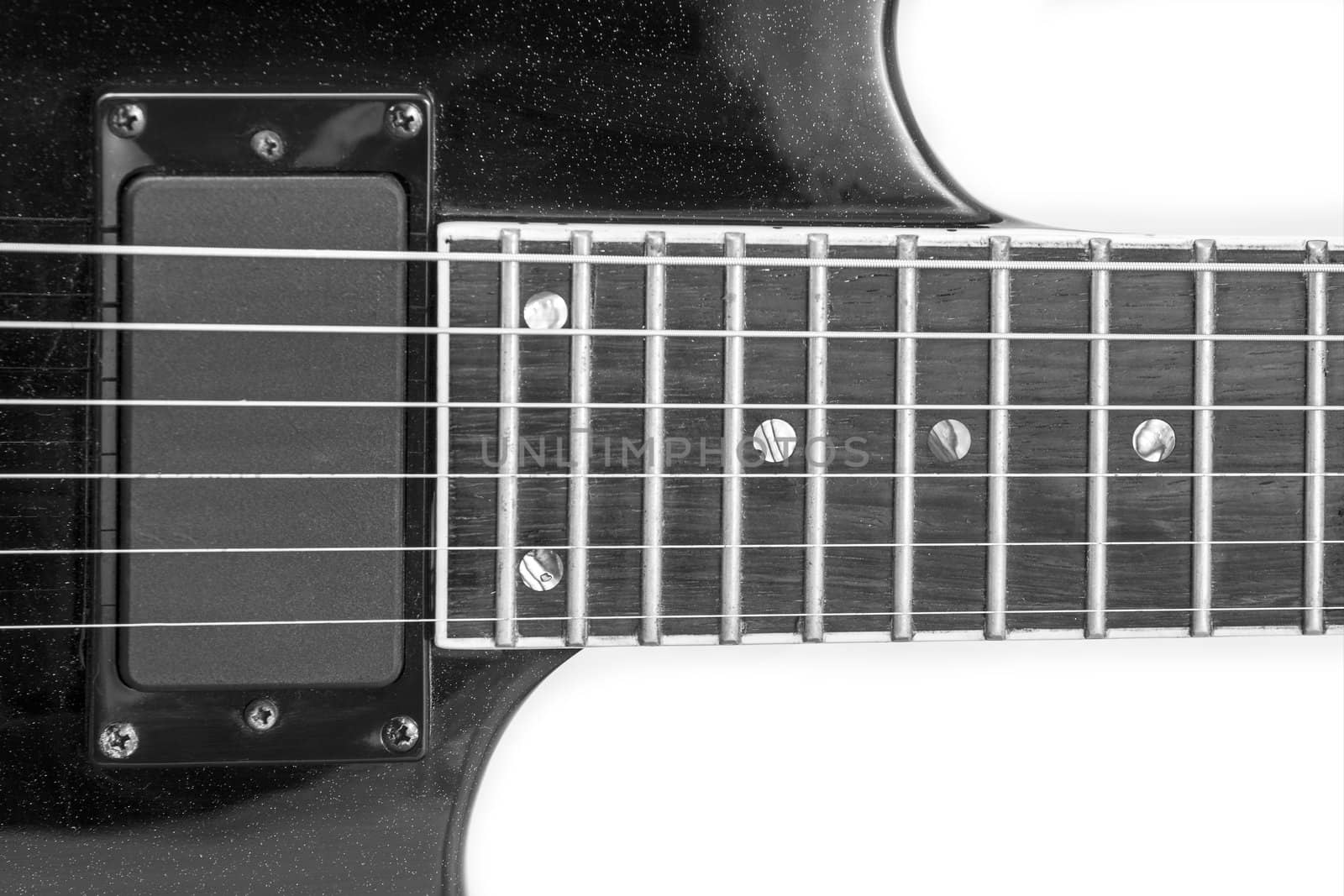 Electric guitar detail shots over white backdrop