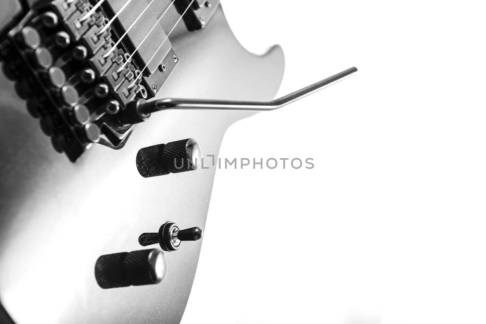 Electric guitar detail shots over white backdrop