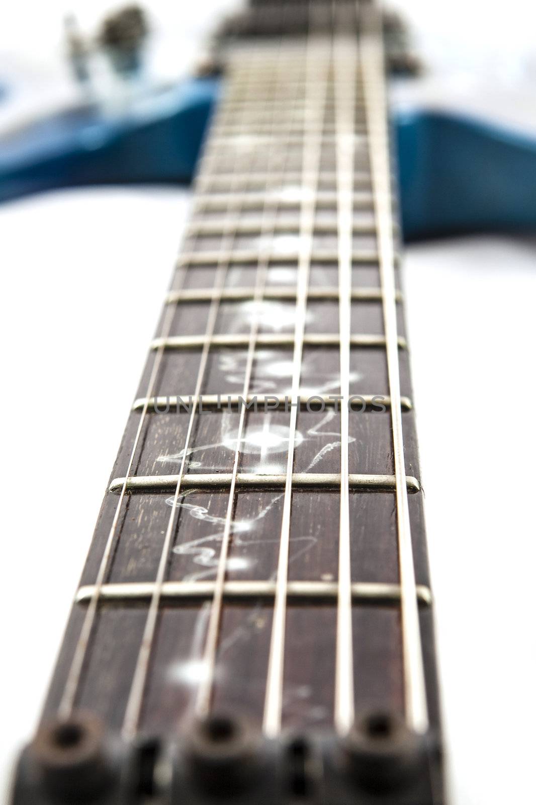 Electric guitar detail shots over white backdrop