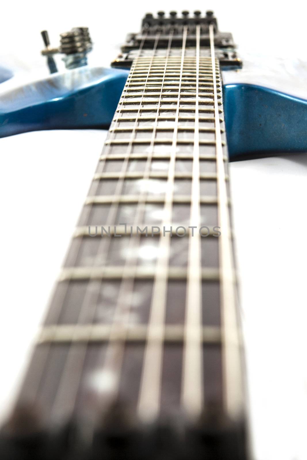 Electric guitar detail shots over white backdrop