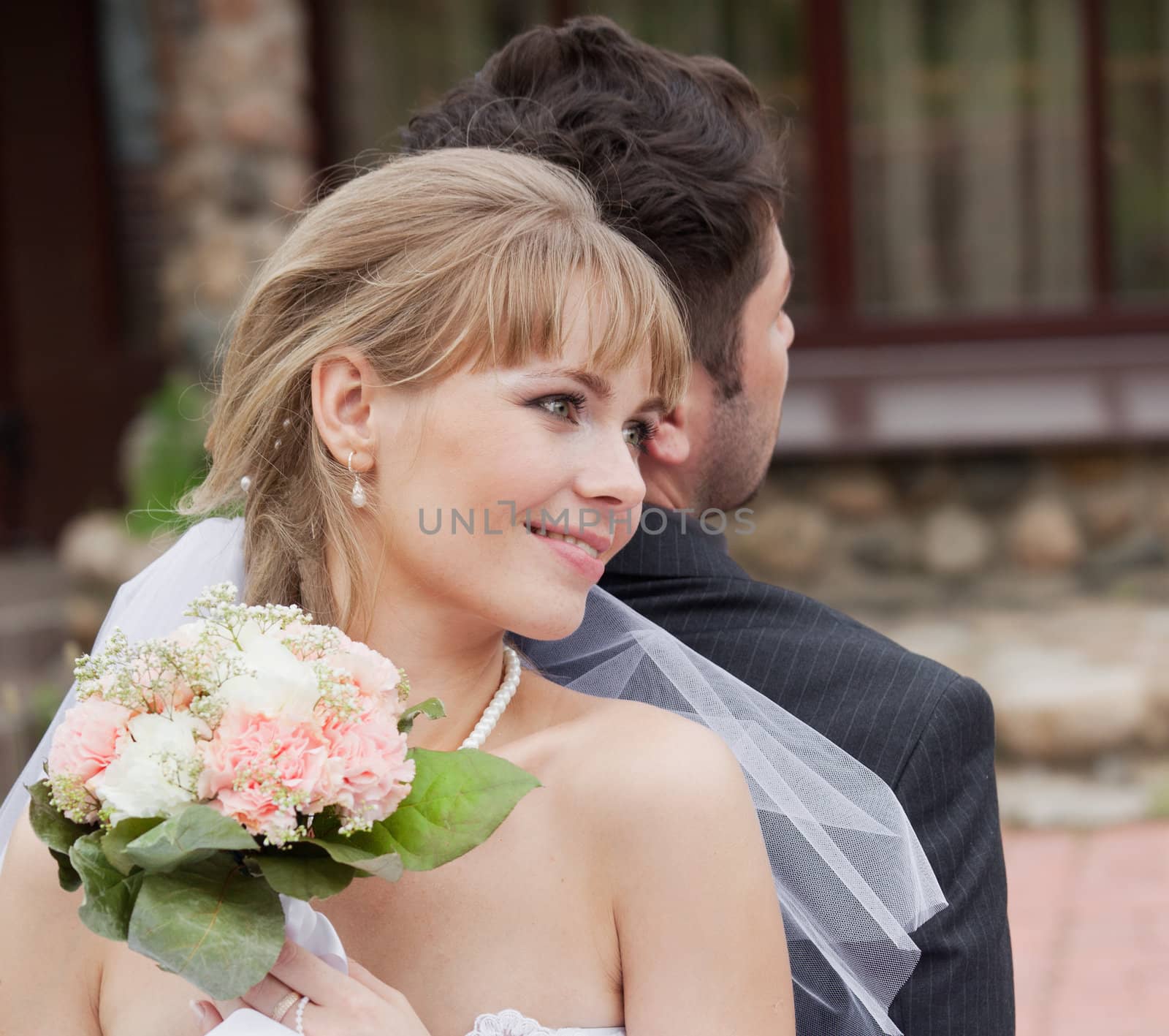 reliable shoulderthe head of the bride leans on a shoulder of the groom