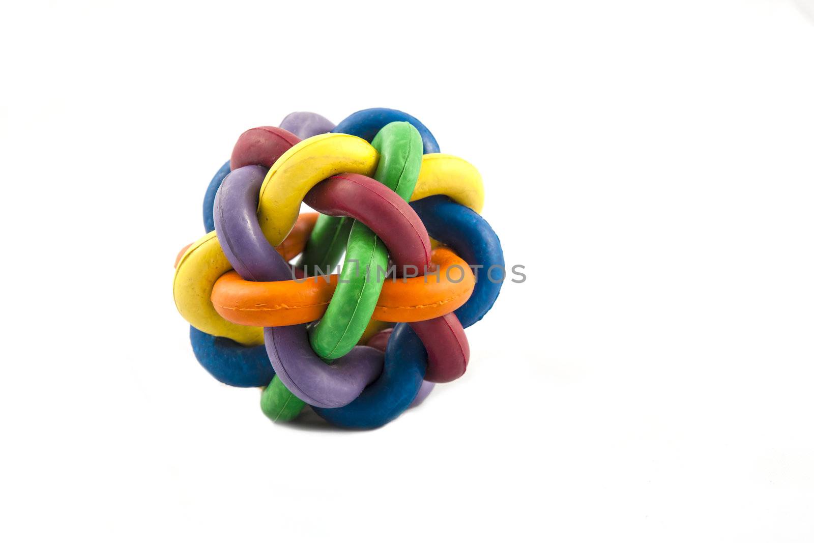 A multi coloured rubber ball dog toy