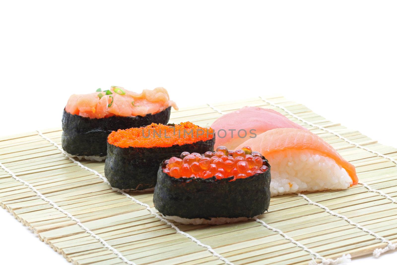 fresh seafood sushi set on traditional bamboo dish