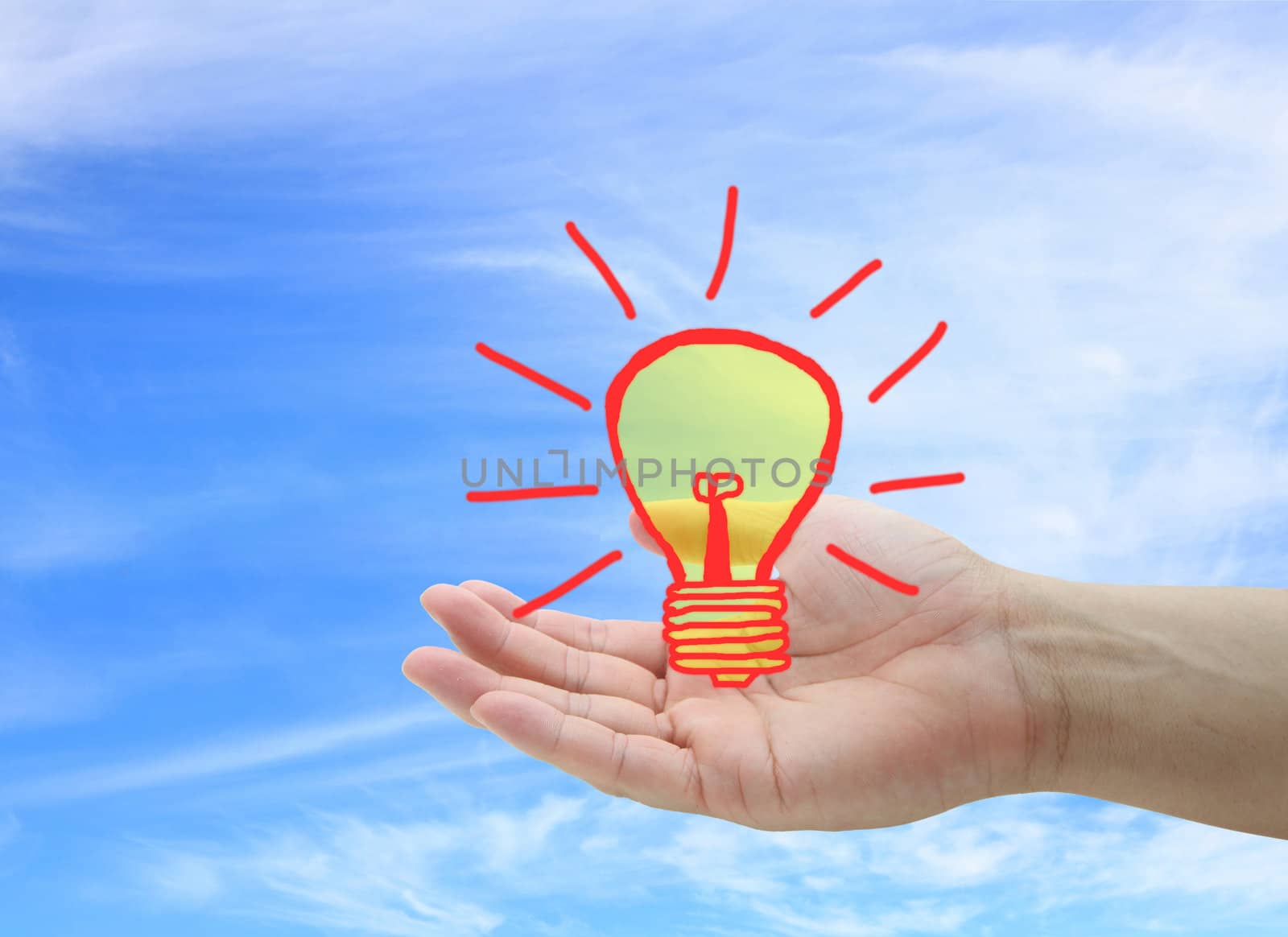 Light bulb on hand for New Idea Concept