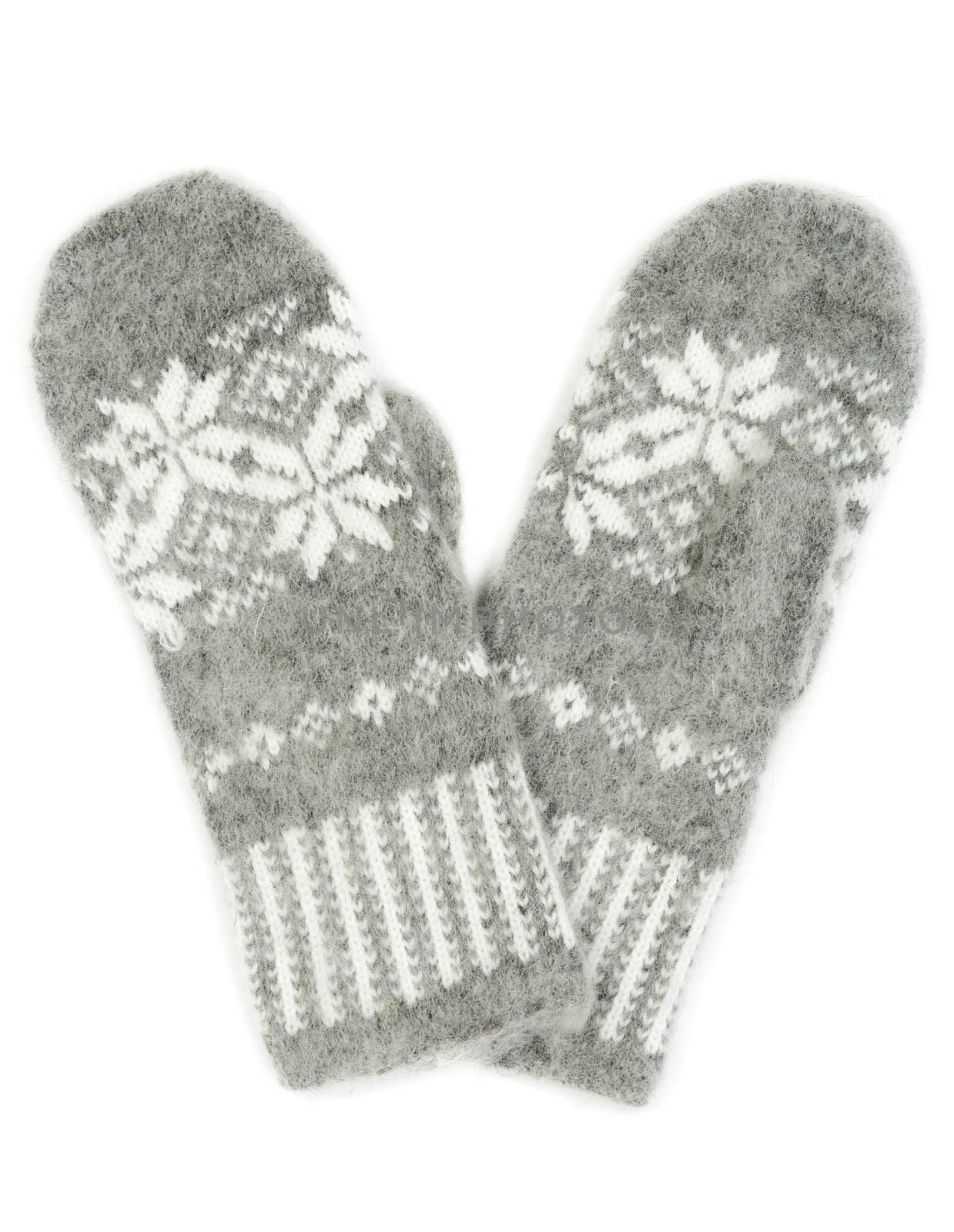 Grey knitted gloves with a pattern of snowflakes isolated on white background