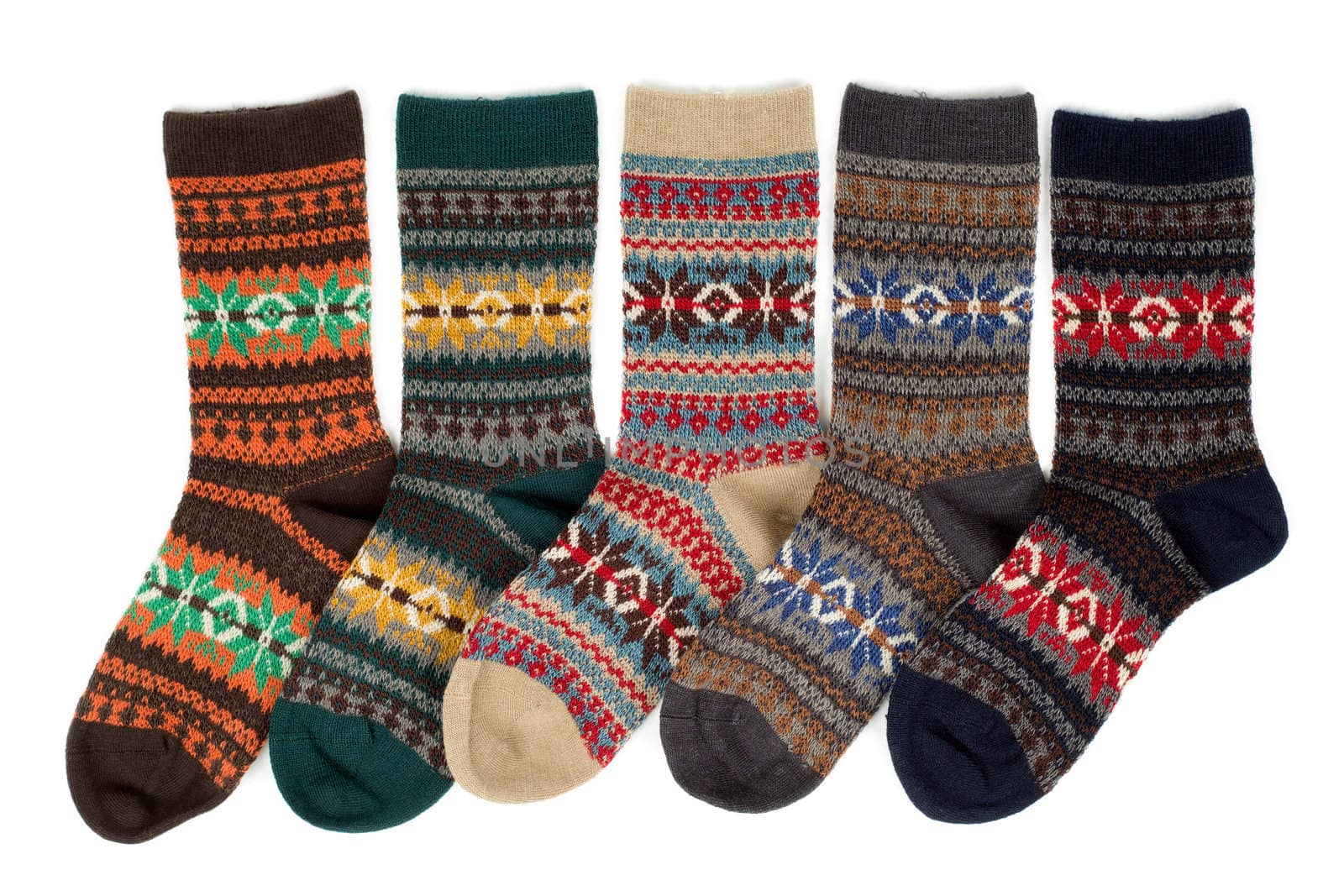 Five of wool socks with a pattern. Isolate on white.