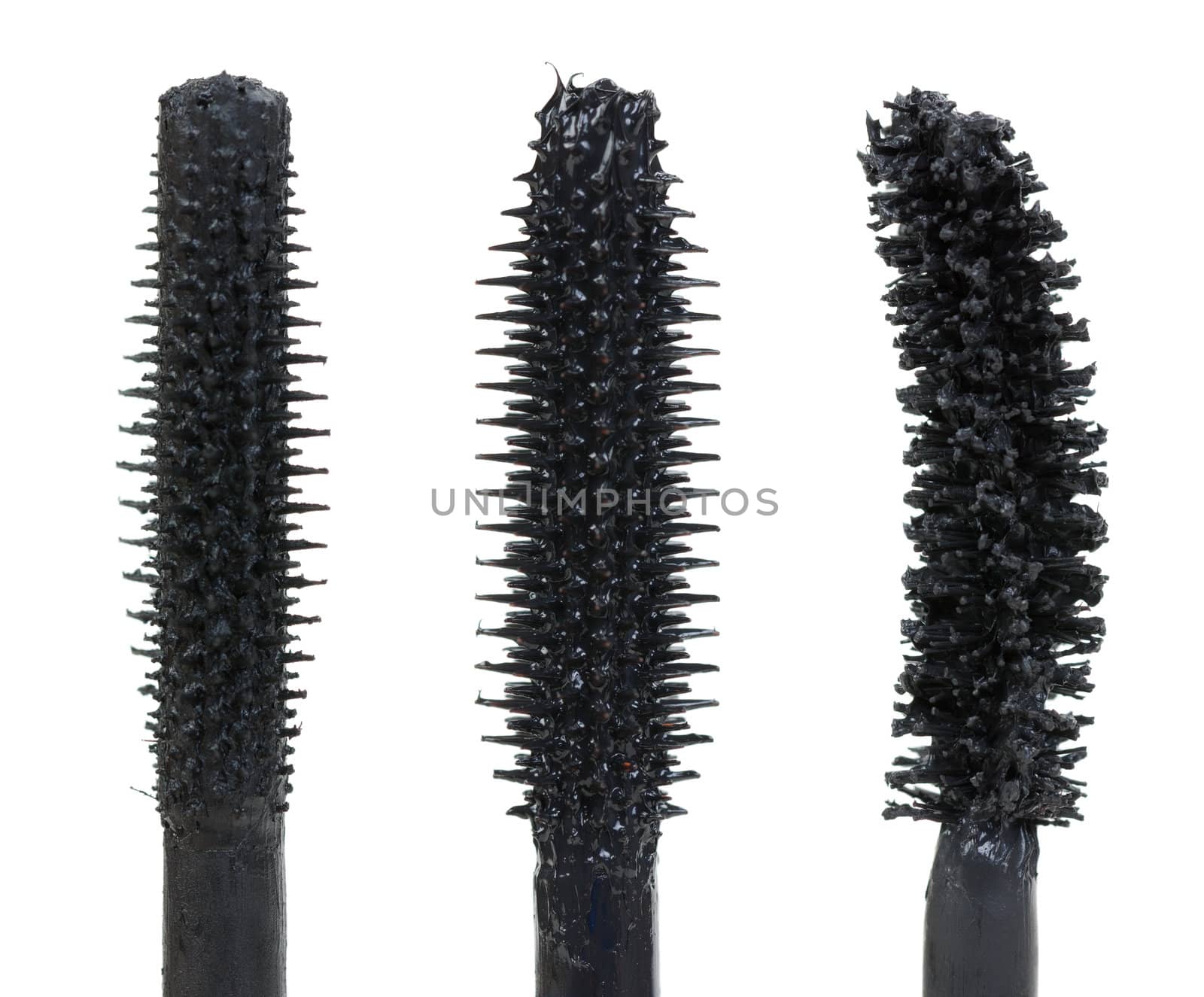 Three color mascara Brushes isolated on white, macro
