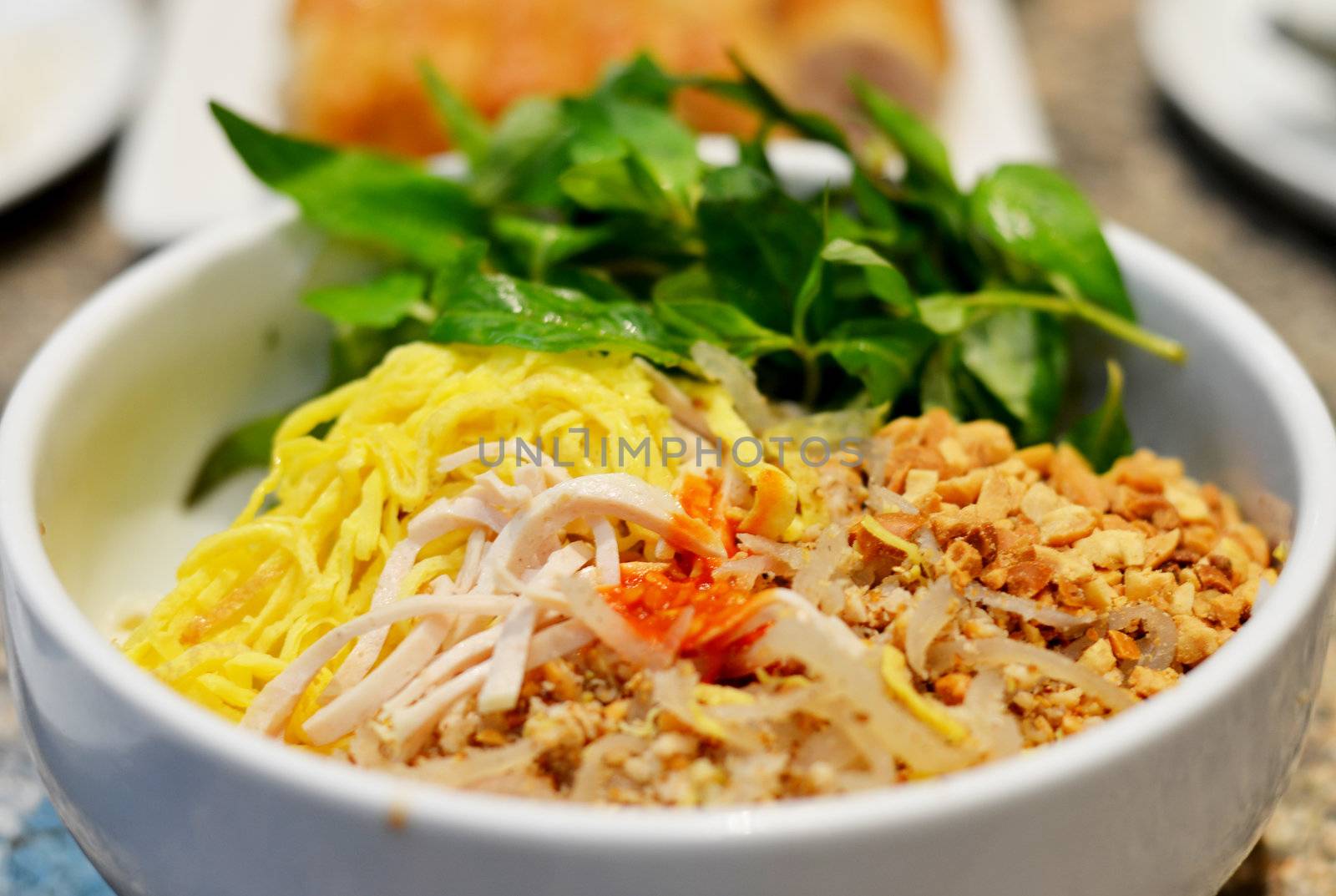 fermented rice vermicelli served with curry and vegetable