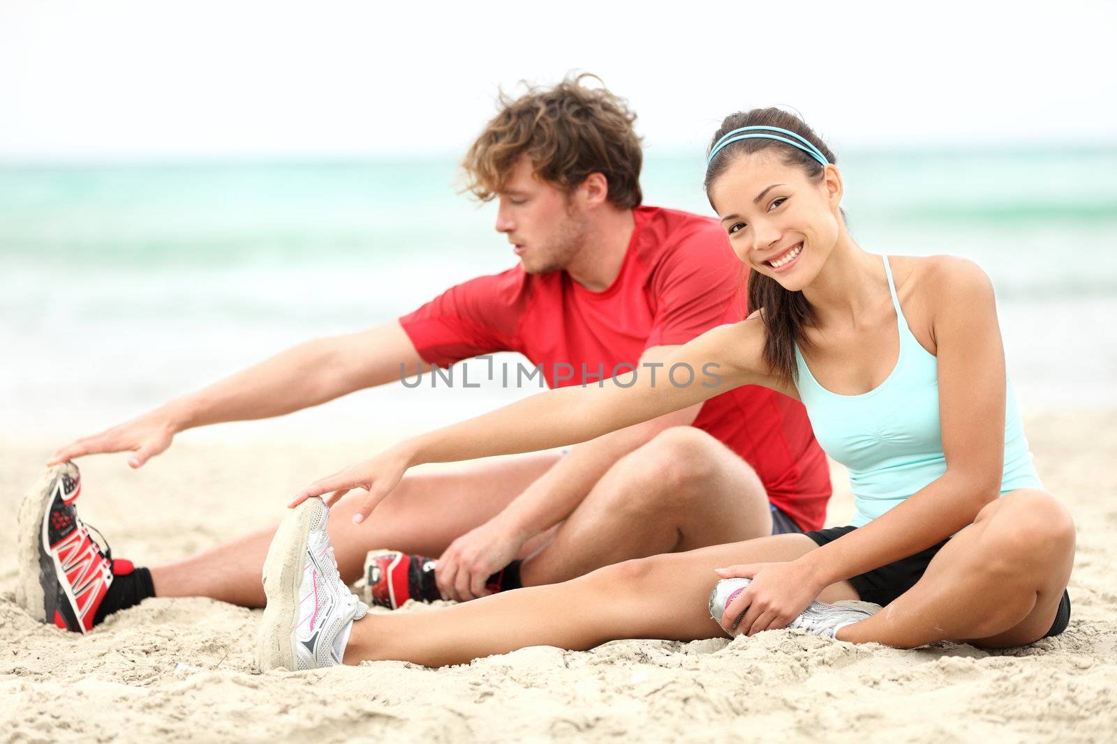 Couple training on beach by Maridav