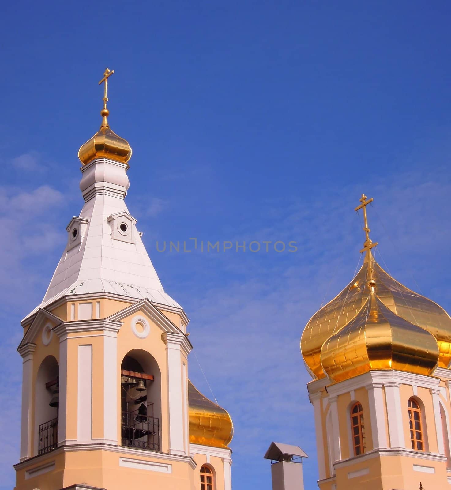 Urban church with golden cupolas