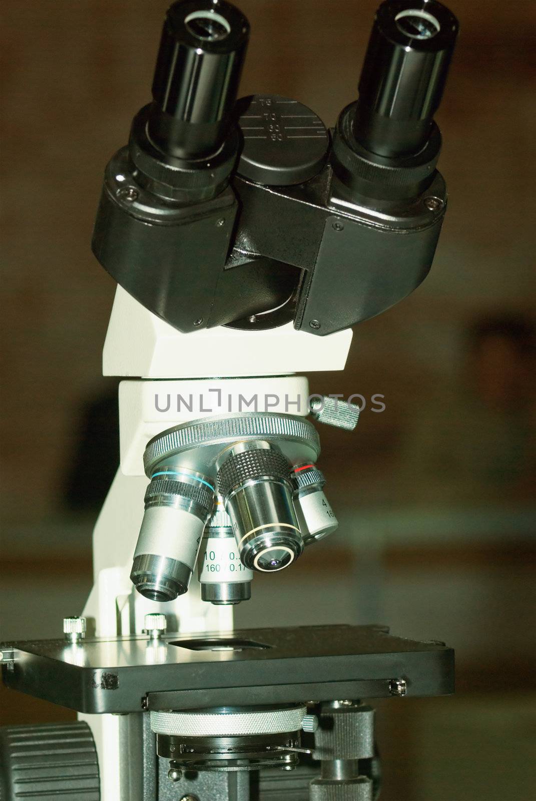 Photo of a professional ocular laboratory microscope with stereo eyepiece