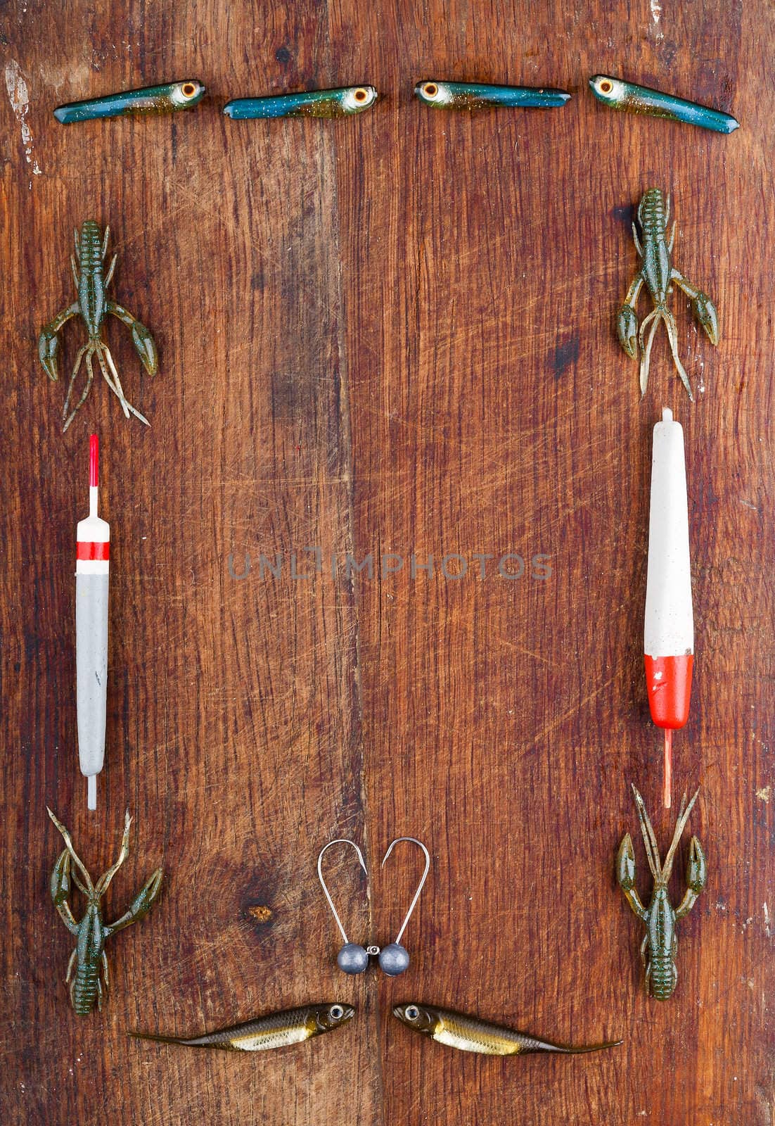 Frame on a wooden background of fishing gear