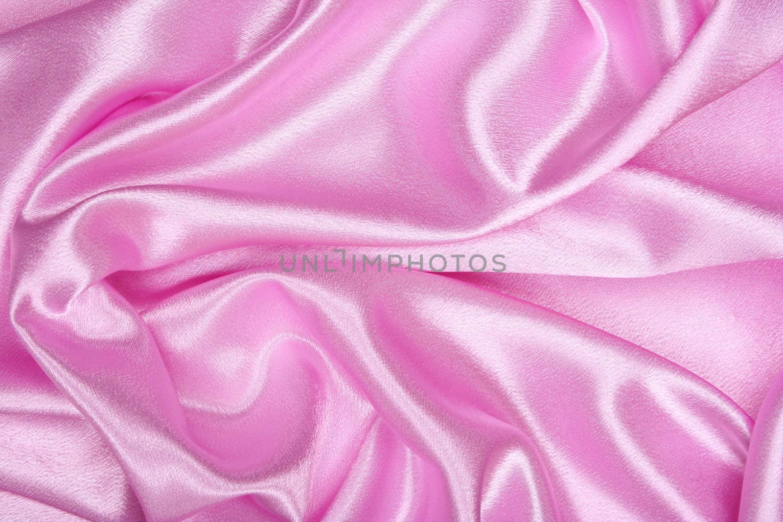 Smooth elegant pink silk as background 
