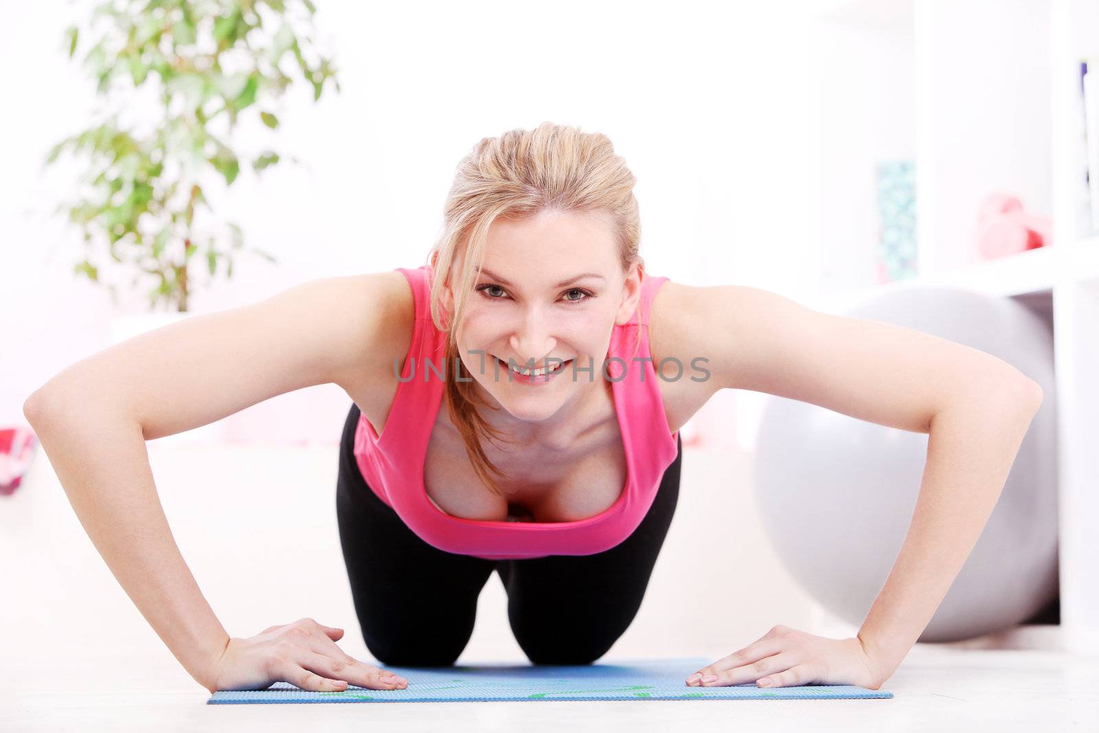 Young beautiful woman working out by rufatjumali