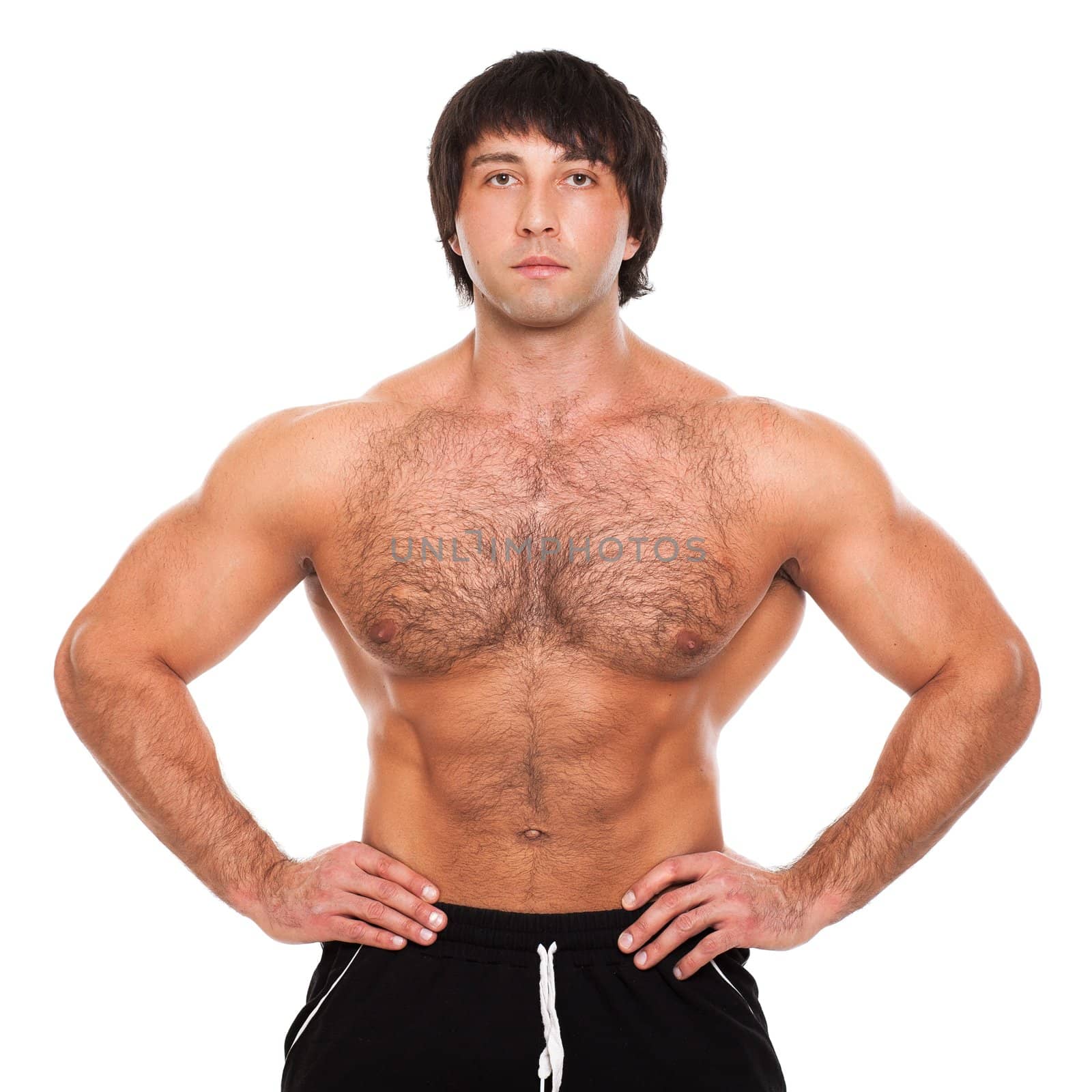 Attractive muscular guy isolated over white background