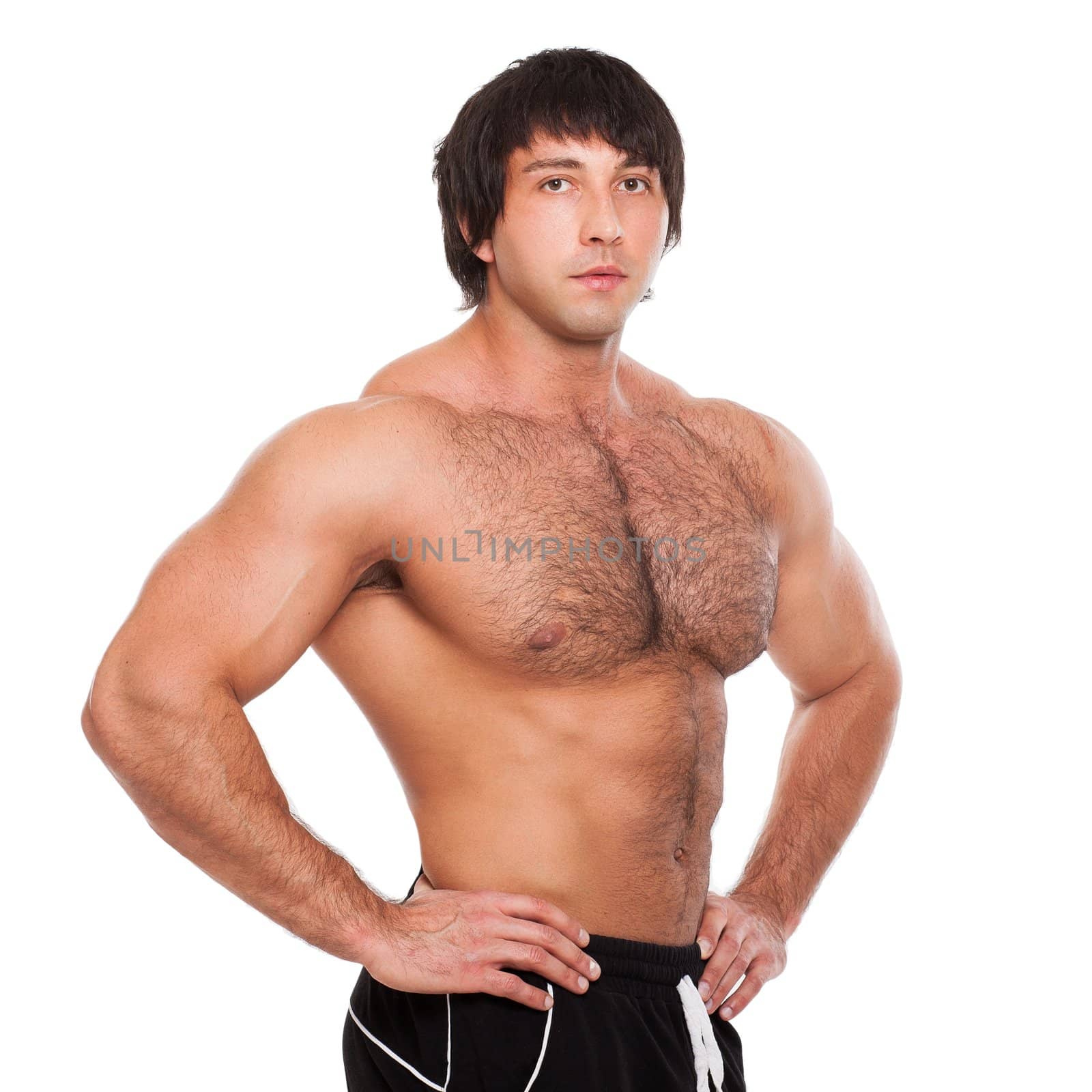 Attractive muscular guy isolated over white background