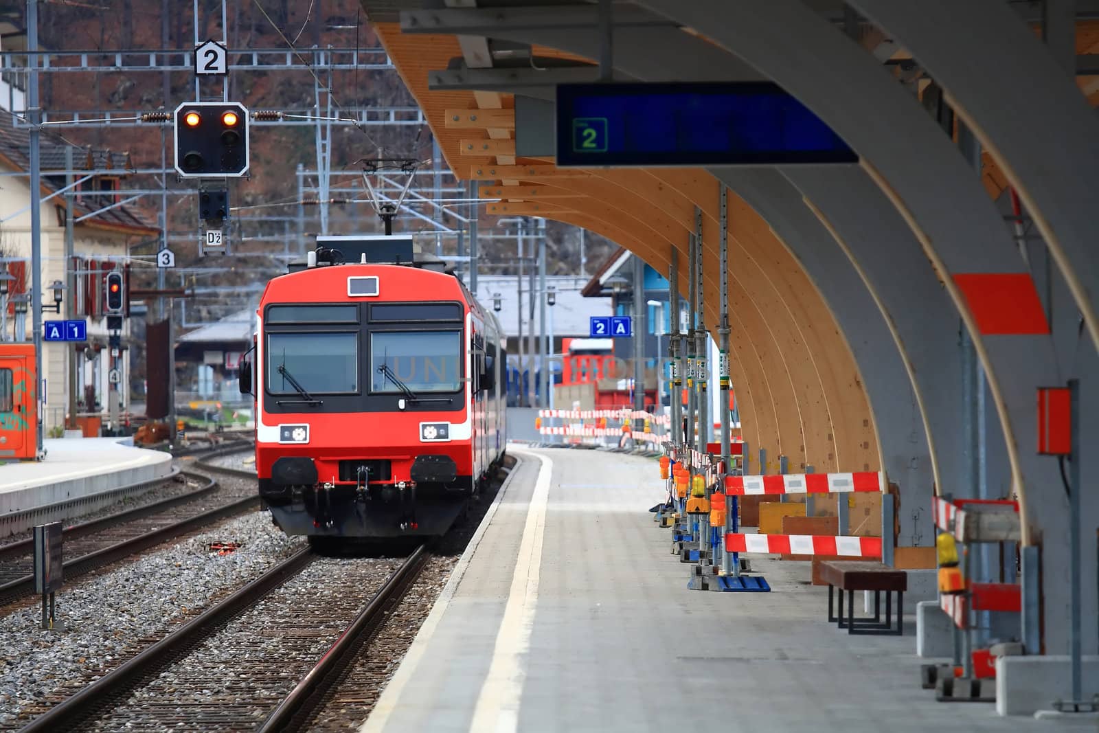 Red Train in Interlaken Station, Switzerland by vichie81