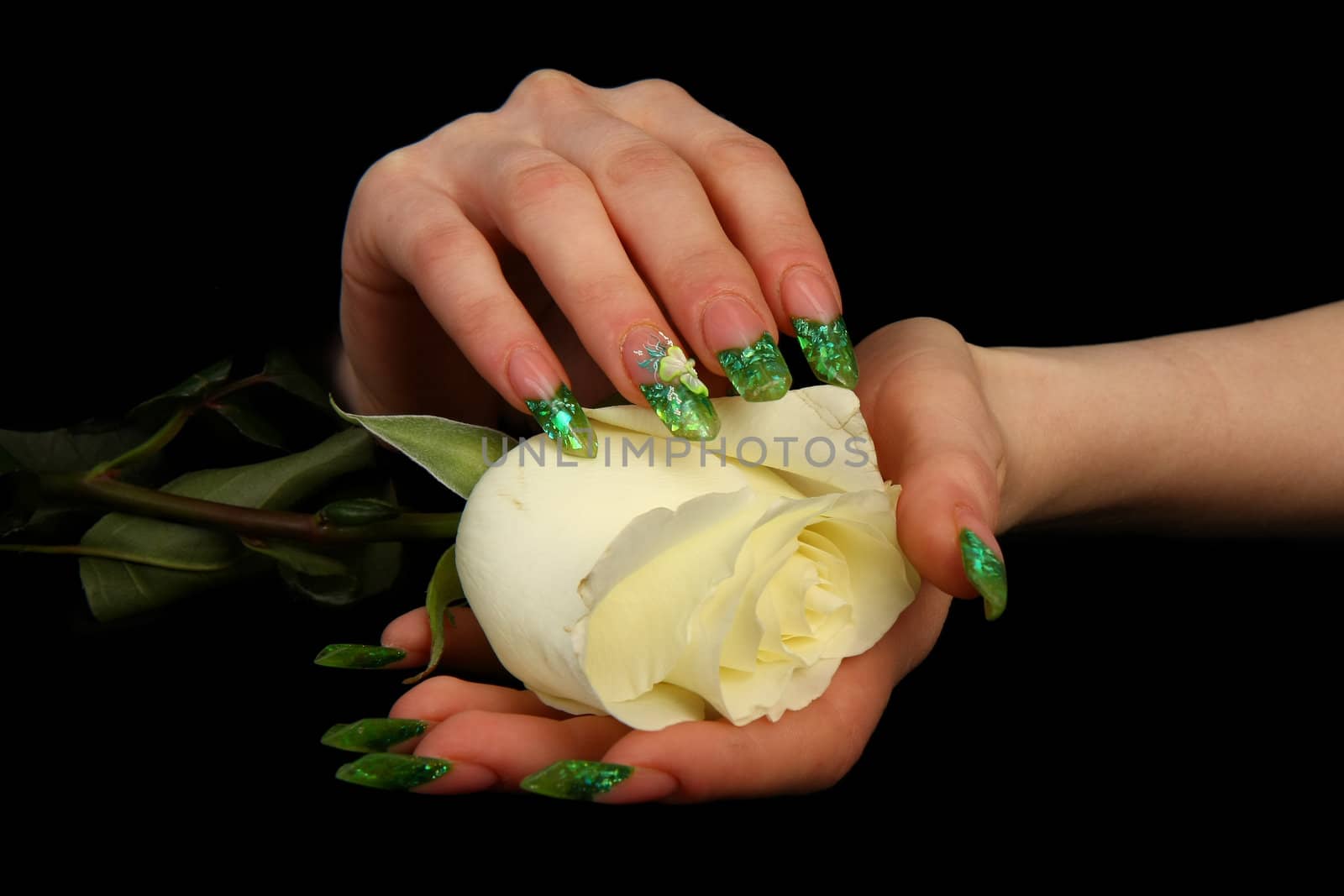 Human fingers with long fingernail and beautiful manicure isolated on black