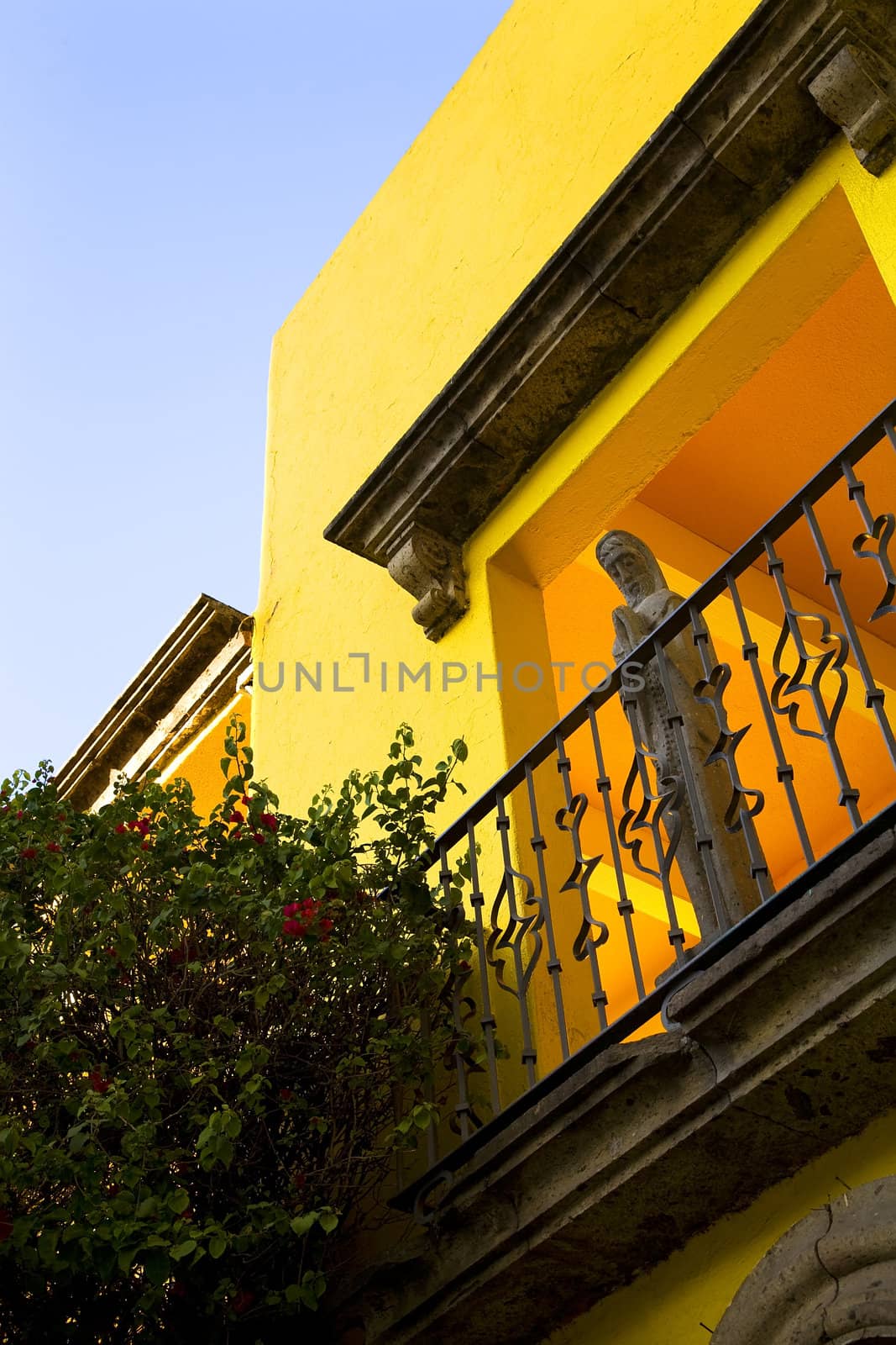 Stone Jesus, Yellow Adobe Wall, Red Flower, Garden Guadalajara Mexico