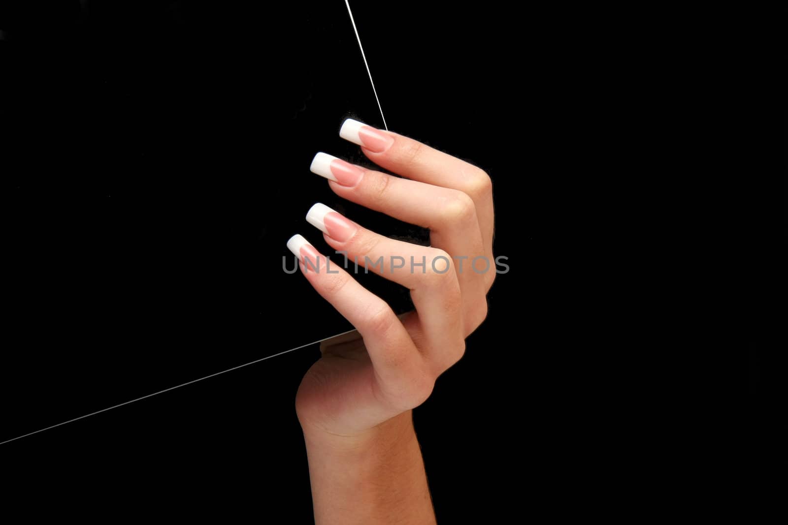 Human fingers with long fingernail and beautiful manicure isolated on black