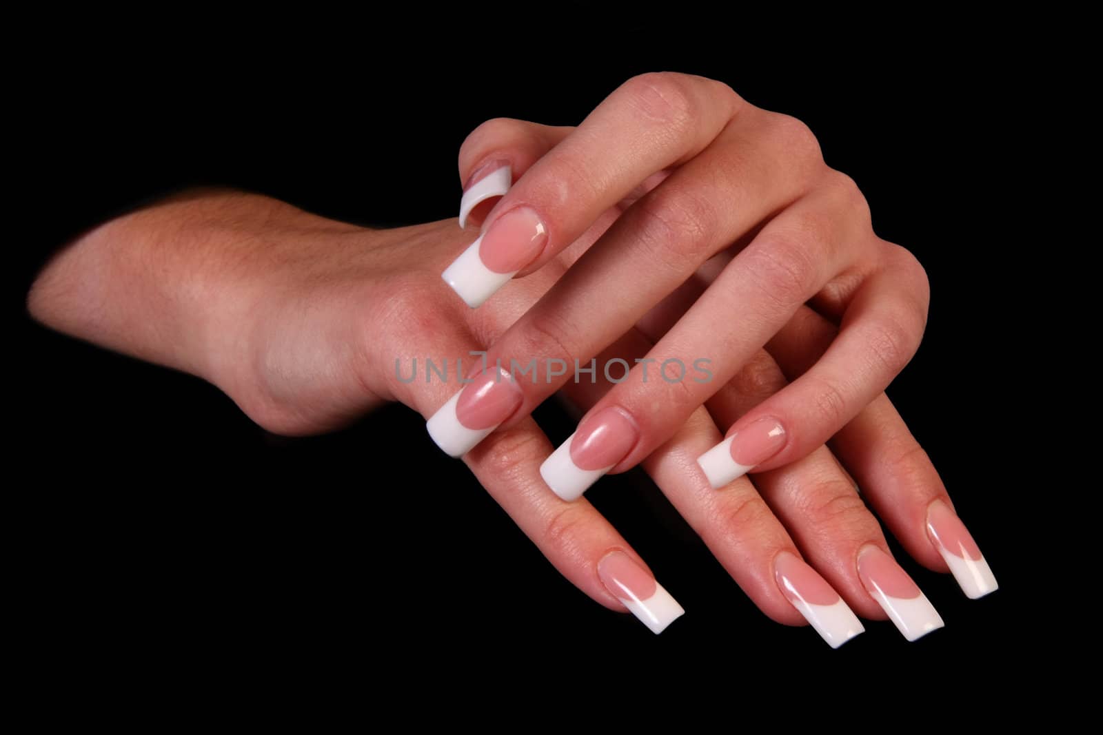 Human fingers with long fingernail and beautiful manicure isolated on black