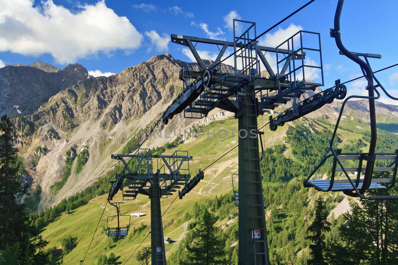 chair lift with Mont Blanc massif on background