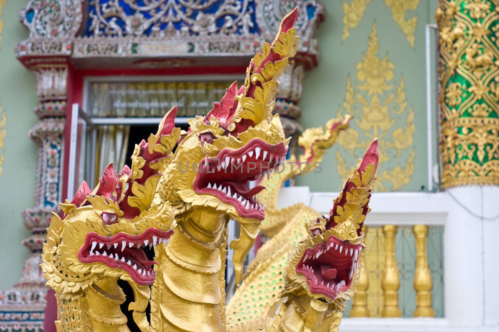 Tri heads Dragon idol in Buddhism temple by pixbox77