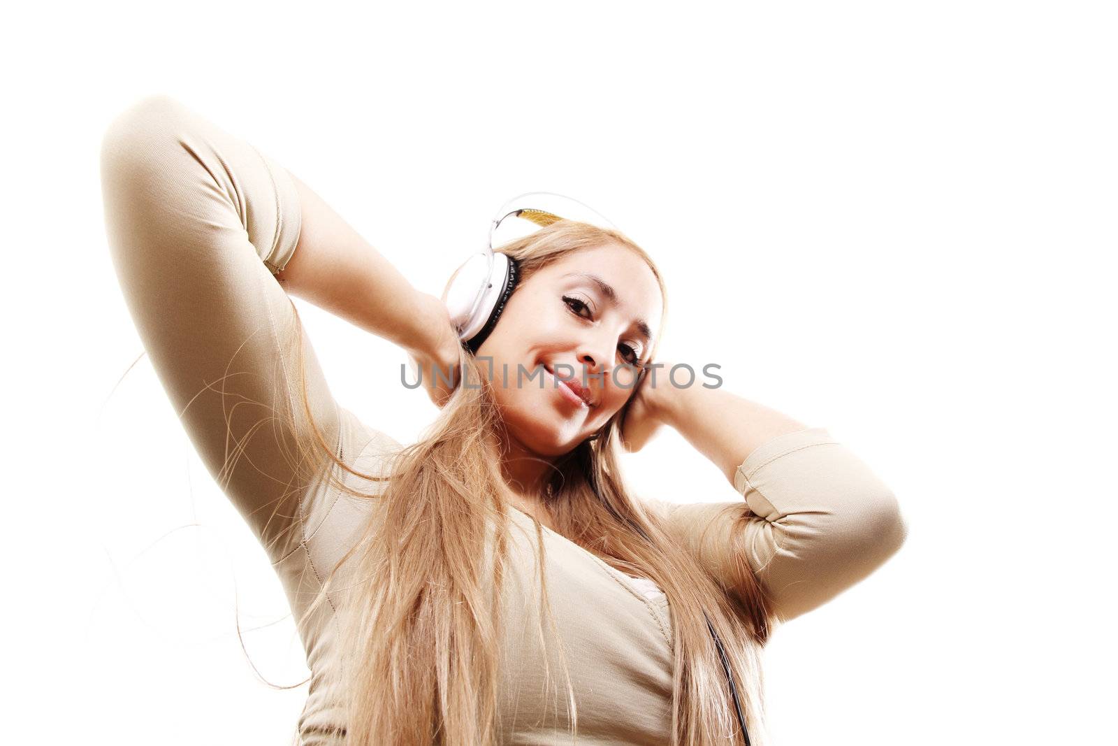 A girl listening to Music with Headphones.