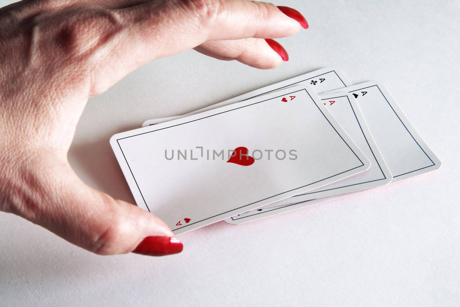 close up of playing cards poker game on white background