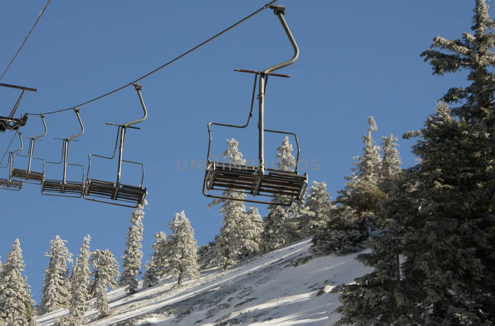 Empty chair lifts at Mr. Baldy Ski Resort