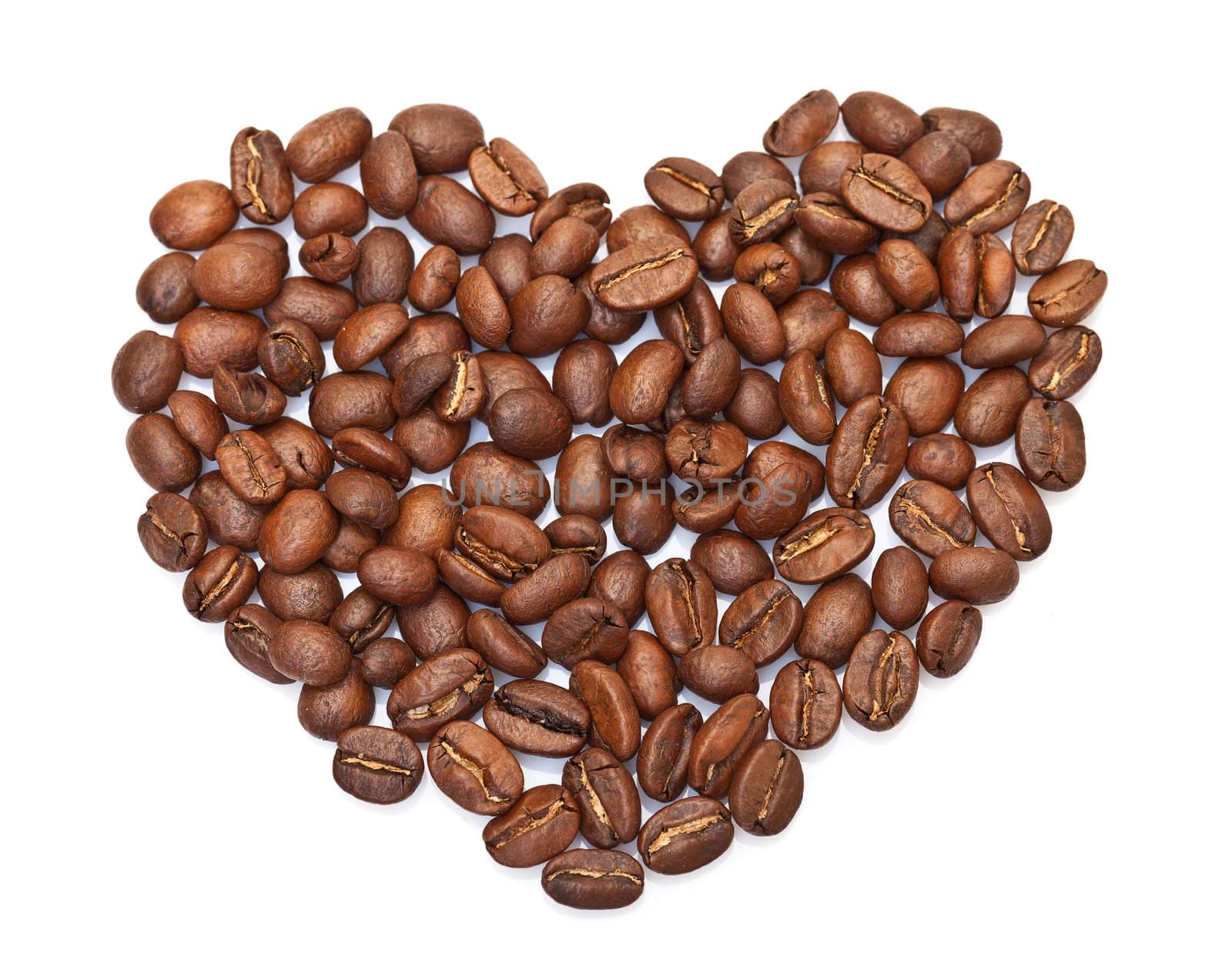 heart made ​​from coffee beans on white background