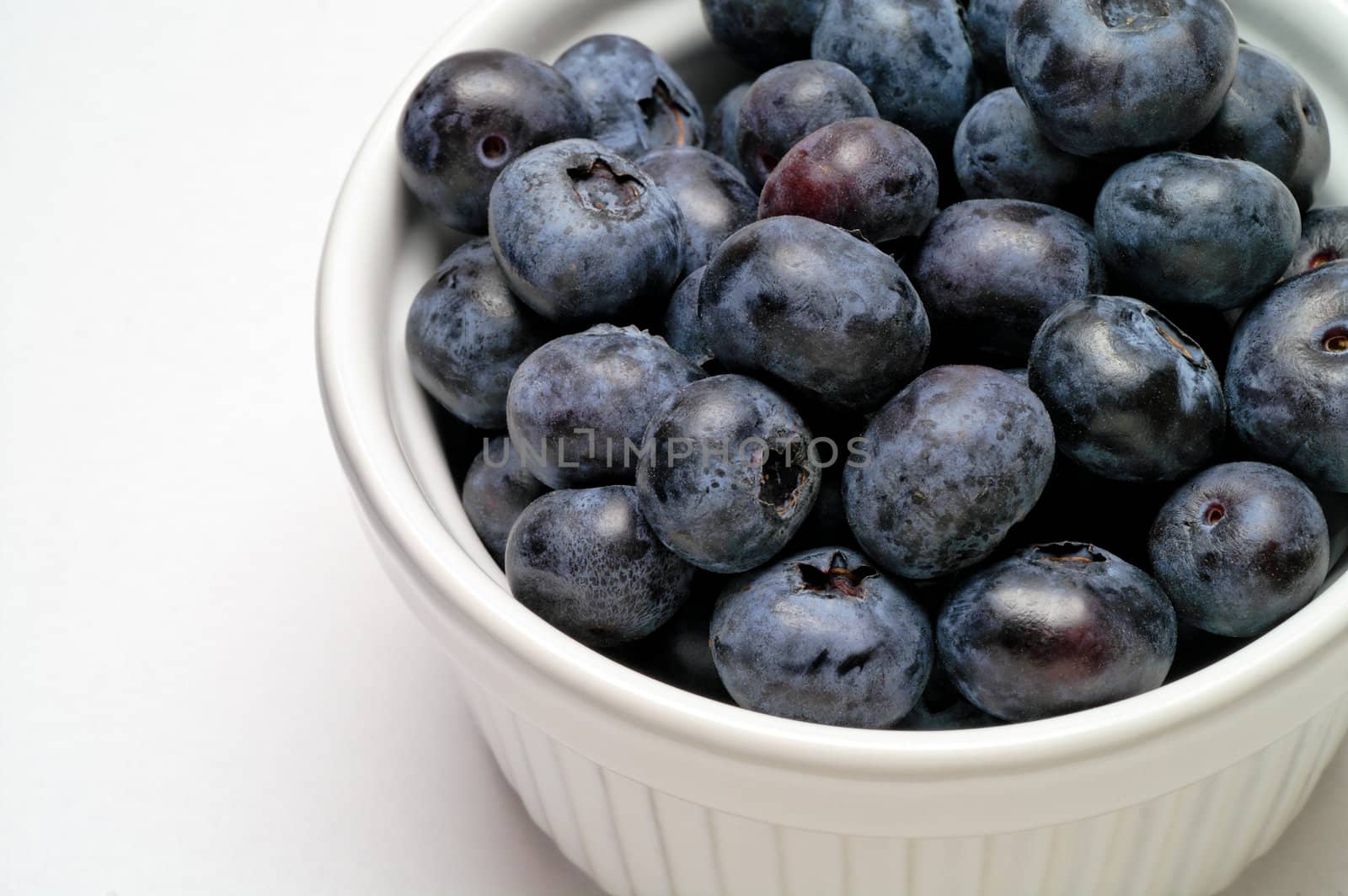 Blueberries in a cup (2) by Laborer