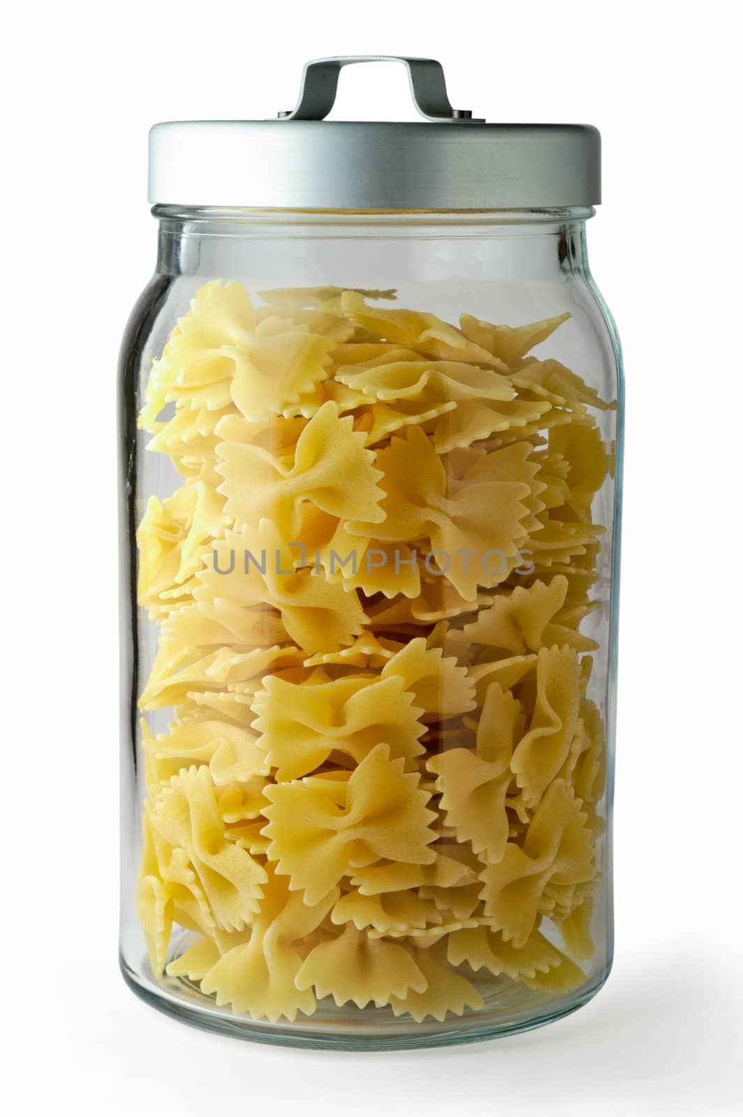 Raw pasta in glass jar with clipping path