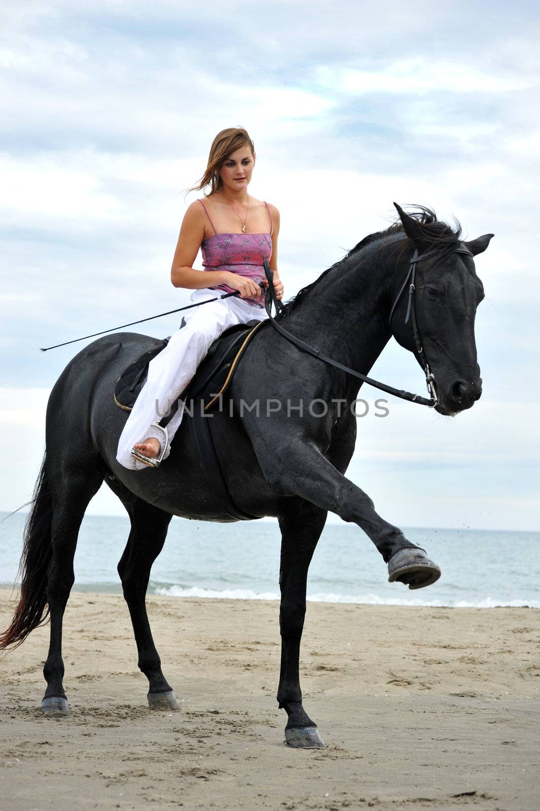 girl and  horse on the beach by cynoclub
