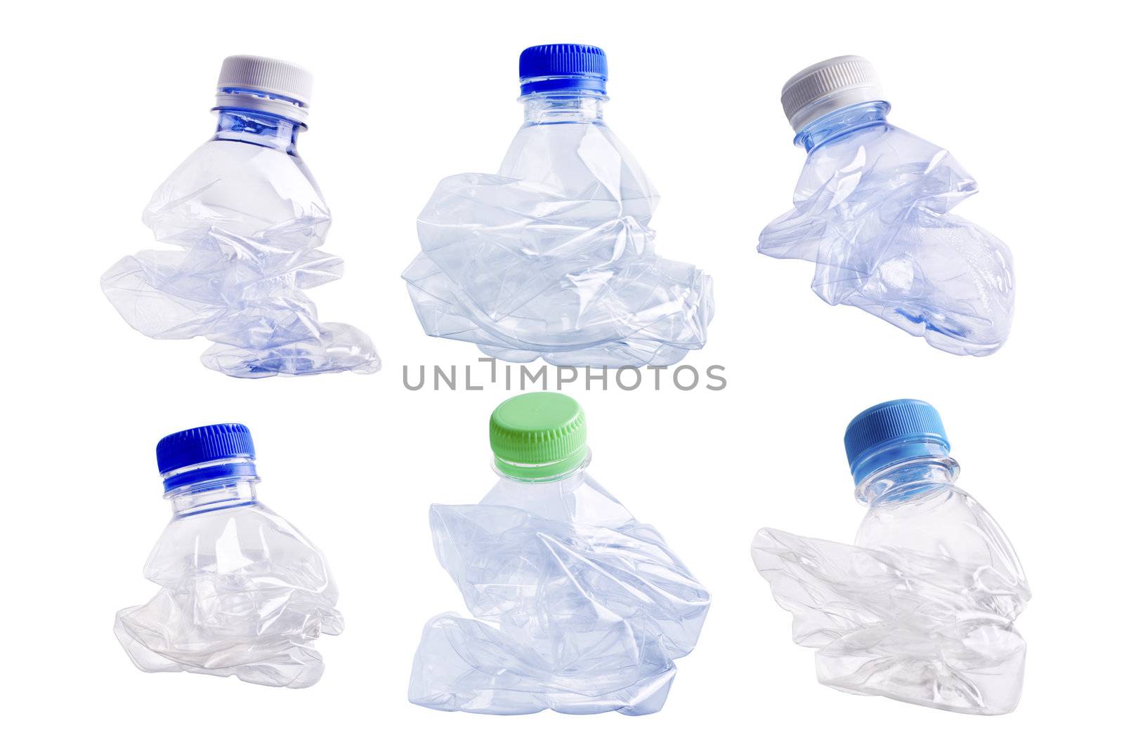 Collection of squashed plastic bottle on white background