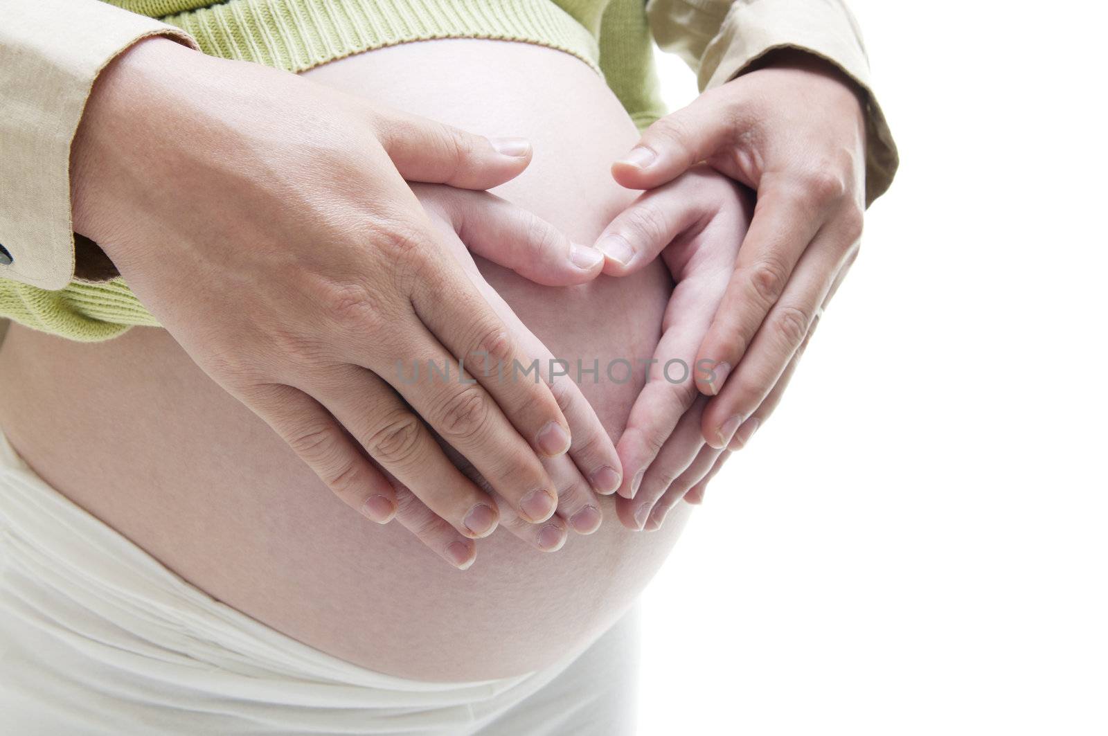 Mom and Dad with hands on the baby, on white background.