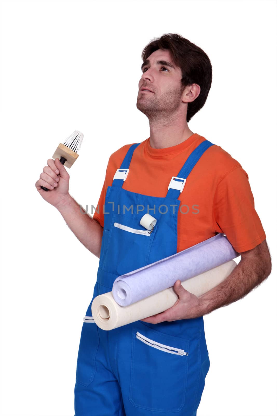 handyman going to stick roll papers