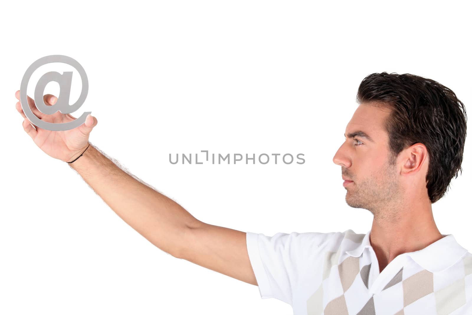 Man holding the at symbol