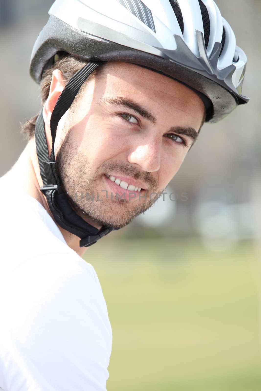 Portrait of man with bike helmet