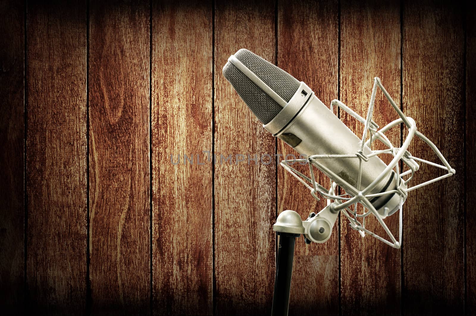 Microphone in studio with wooden wall, Music studio concept