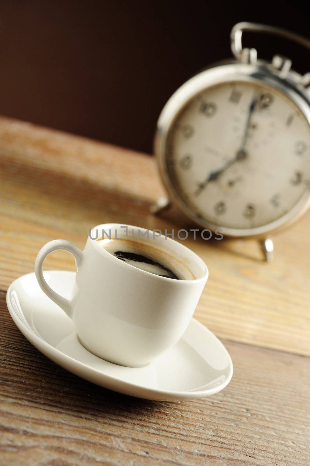 Alarm clock and coffee cup  by stokkete
