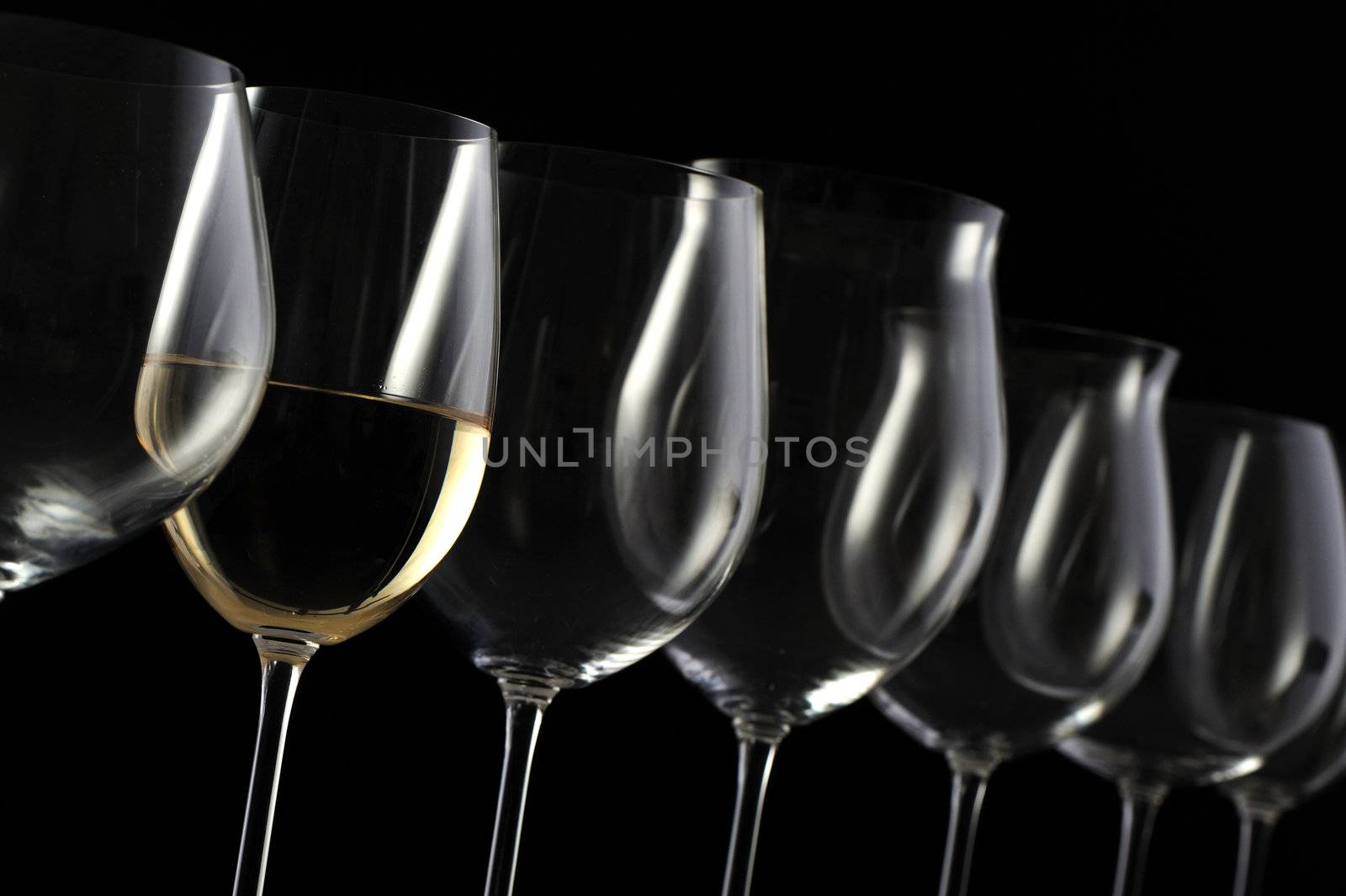 wine glasses group on dark background