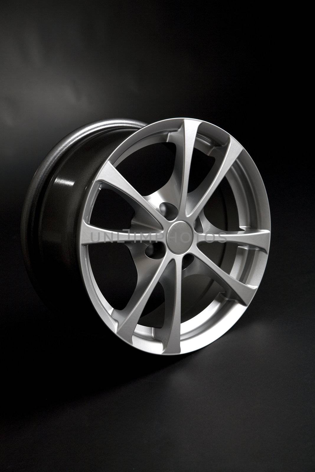 Alloy rim on black background by stokkete