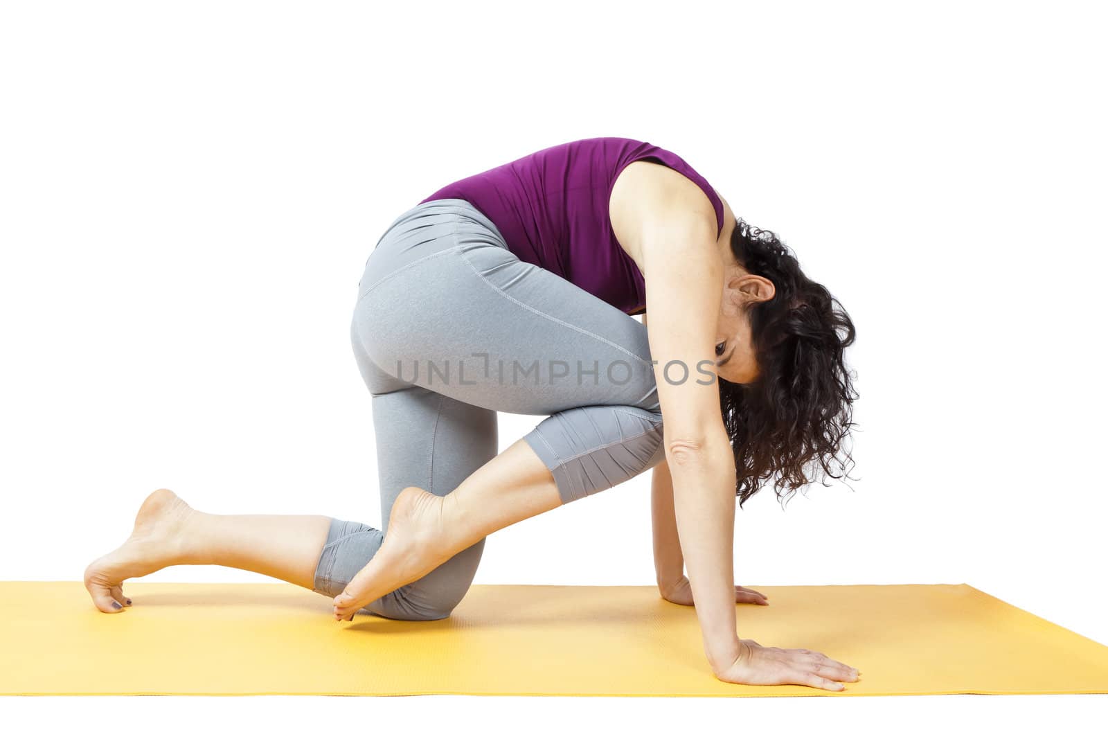 An image of a pretty woman doing yoga