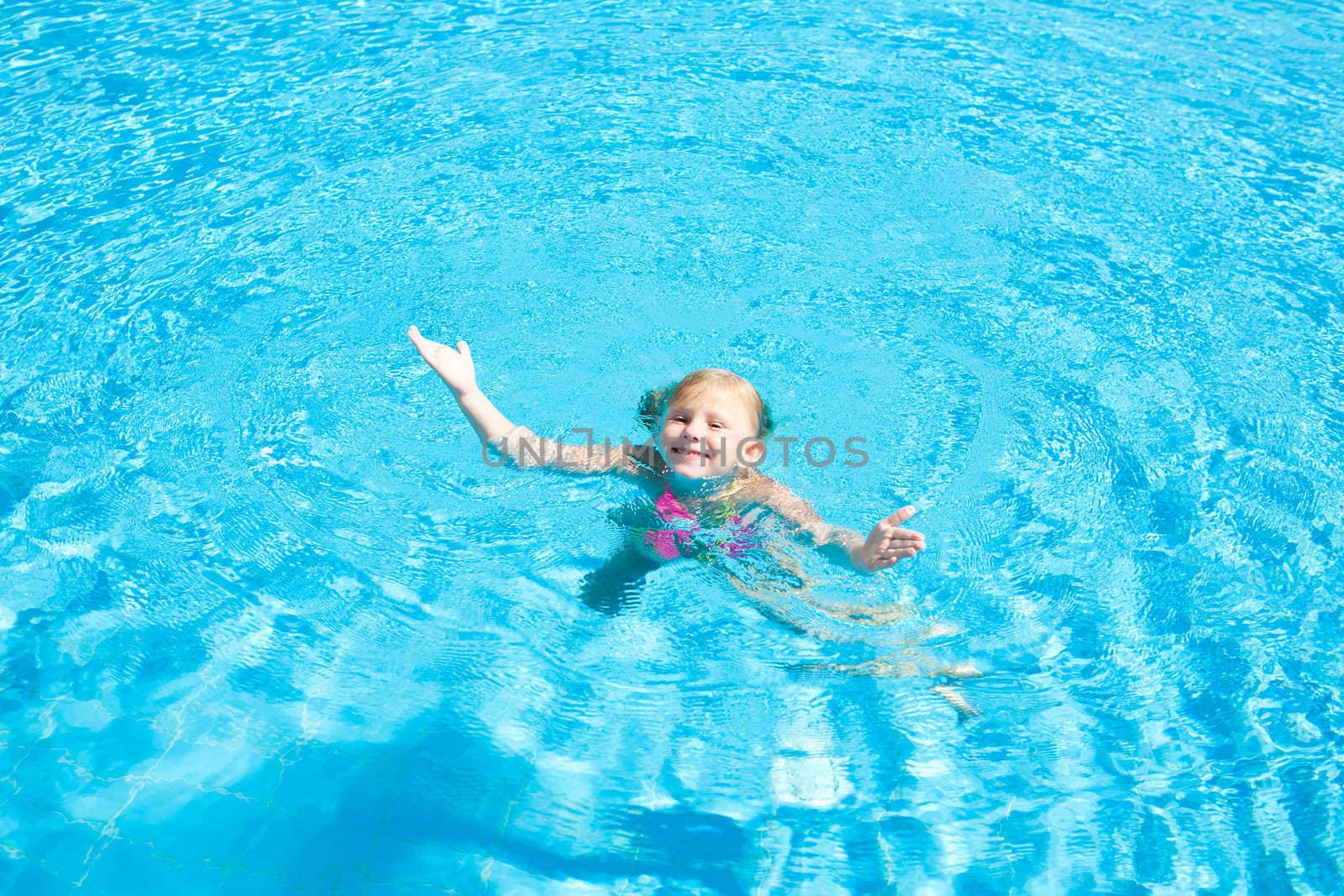 swimming small girl