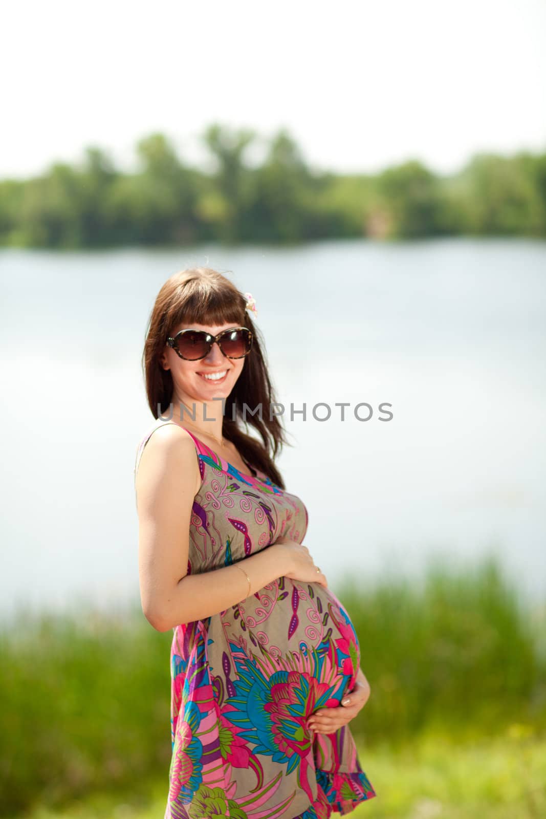 pregnant girl near the lake by vsurkov