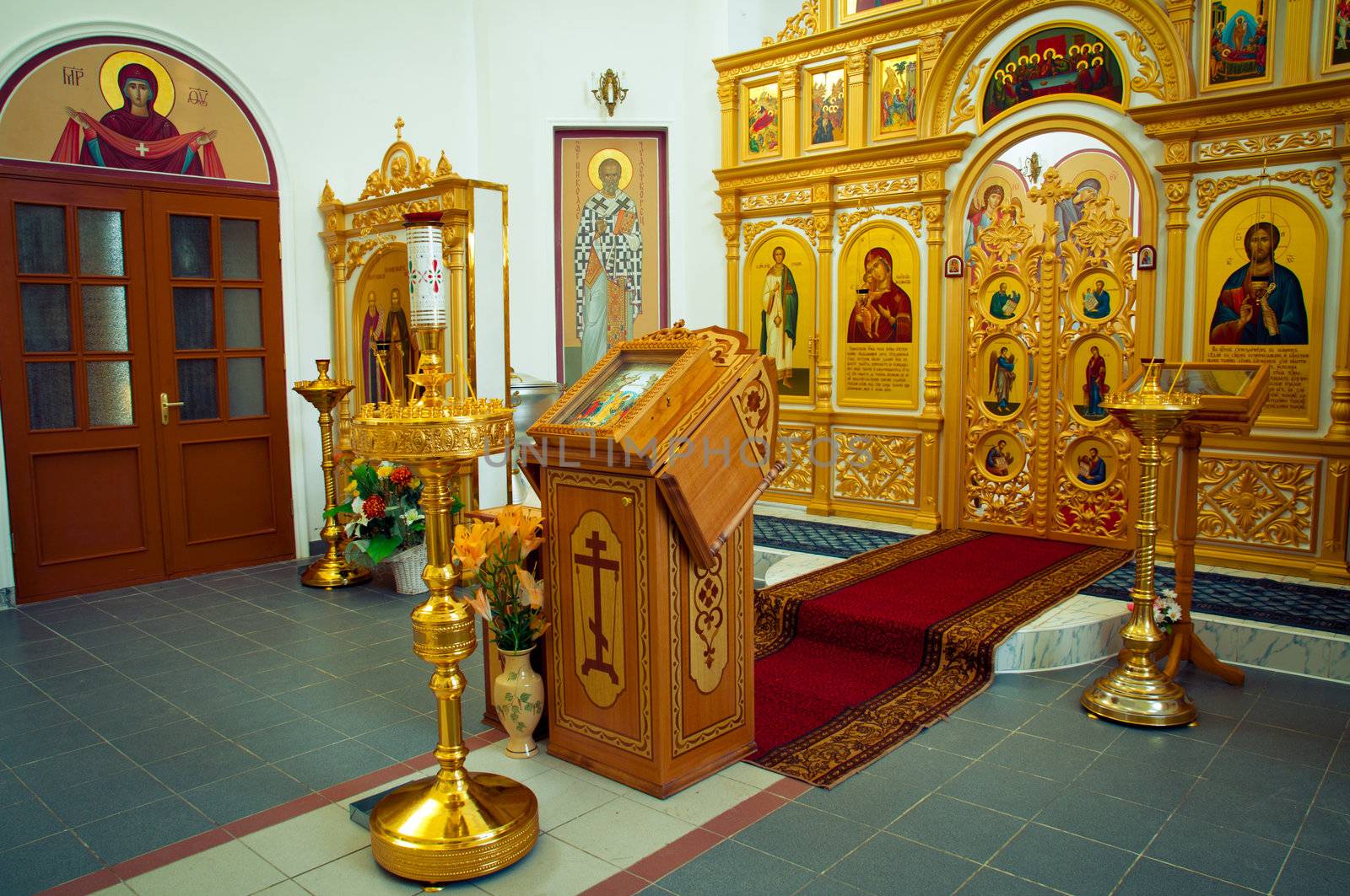 Beautiful church interior in golden light. 
Temple Theodore icon the Mother of God in Vorsino