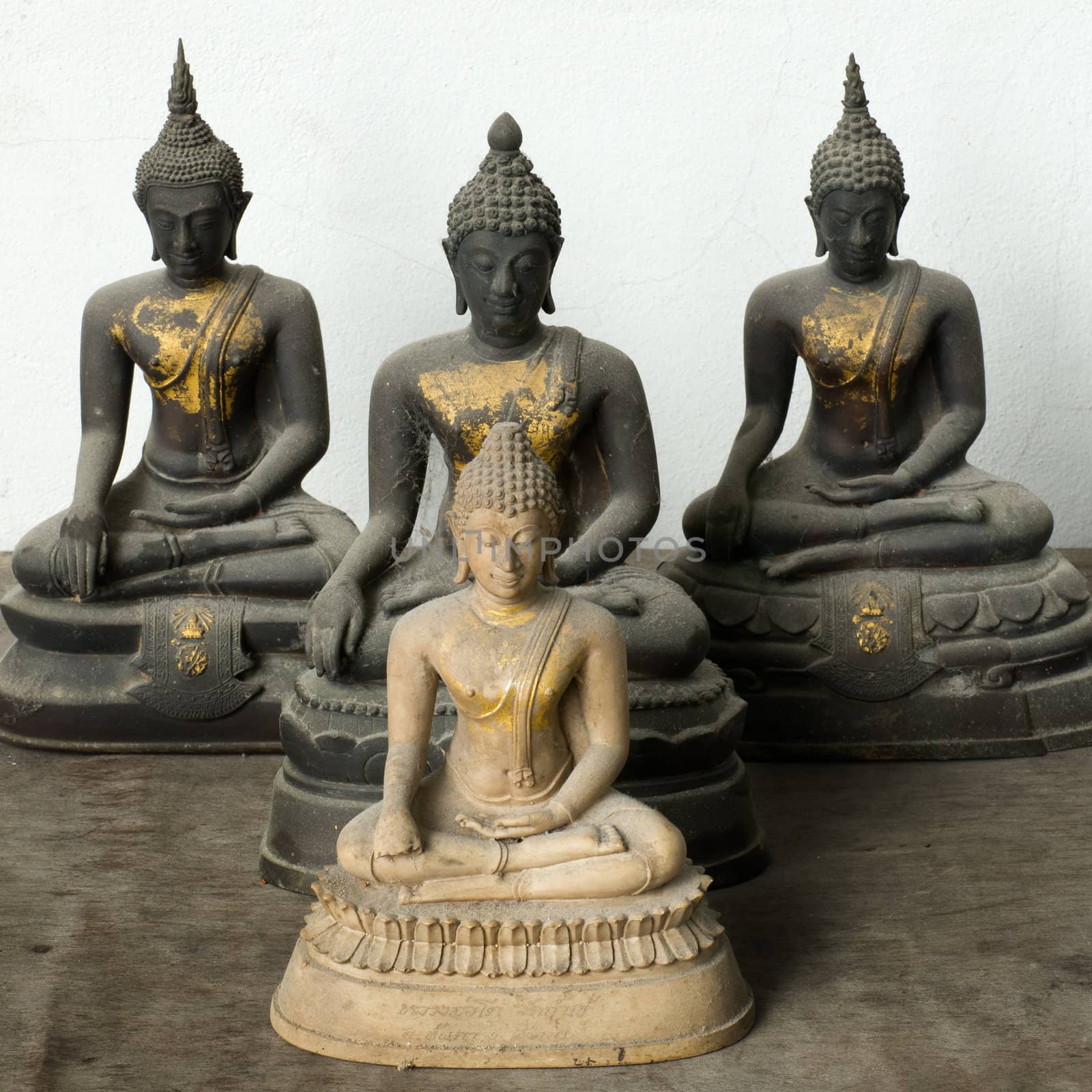 Light Stone Buddha and Three Dark statue by nuttakit