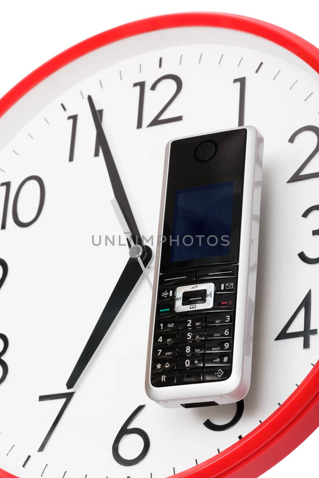 Modern phone on a dial of clock